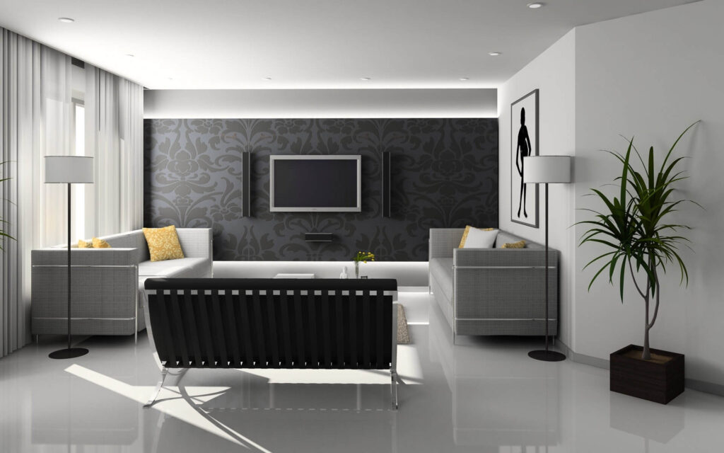Minimalist living room with grey sofas, black accent wall with a television, and large windows.